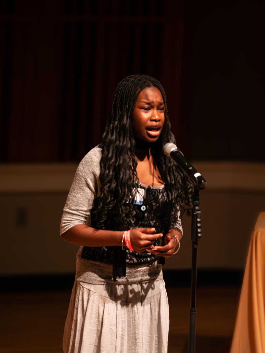 Dioubate emotes her poem